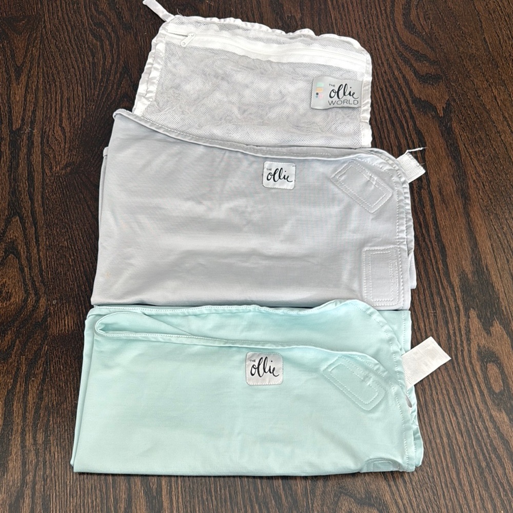 Ollie World Swaddle Set in Gray, and Light Blue with Ollie laundry bag